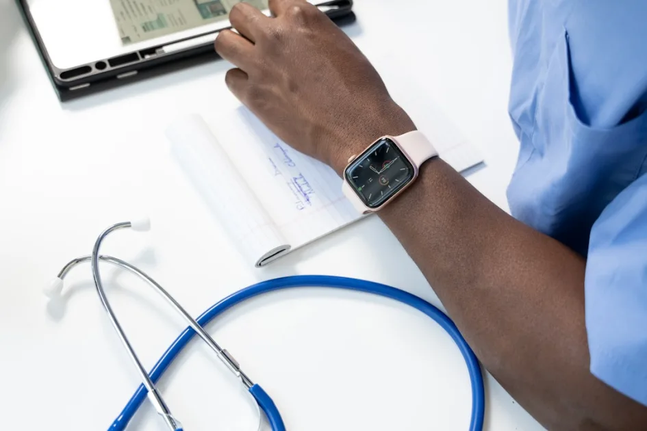Google Ads for doctors budget planning on paper with a watch beside it