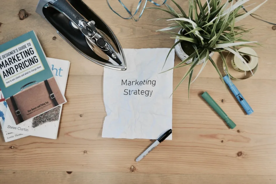 Notepad with pricing spiritual services strategy written on a desk