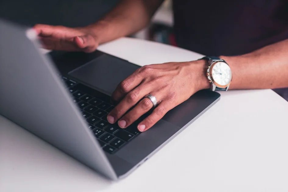 WooCommerce store owner auditing SEO content on a tight schedule using a laptop